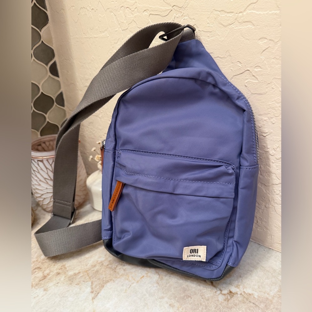 Ori London Willseden crossbody backpack in lilac